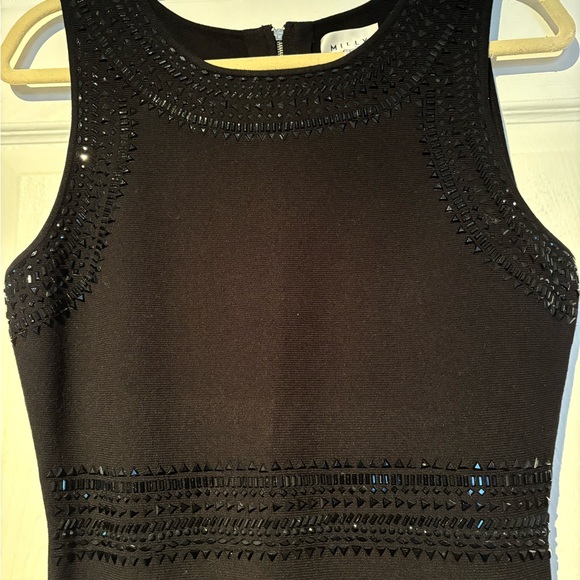 Black Knitted Dress with embroidered beads. - Picture 4 of 9